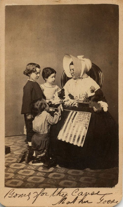 MOTHER GOOSE WITH FLAGS.