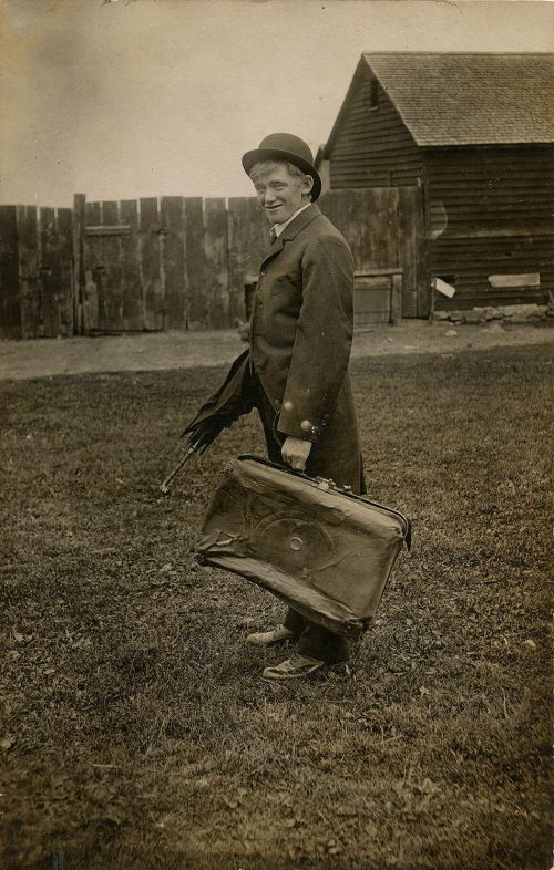 TATTERED SUITCASE