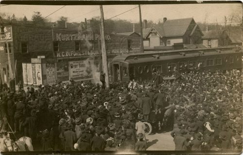 CROWD AT THE TRAIN TRACKS