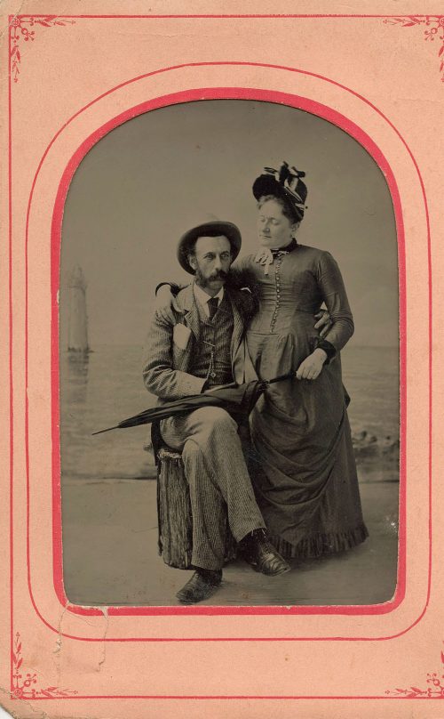 COUPLE AT THE SHORE.