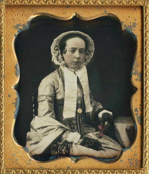 BEAUTY IN A BONNET.