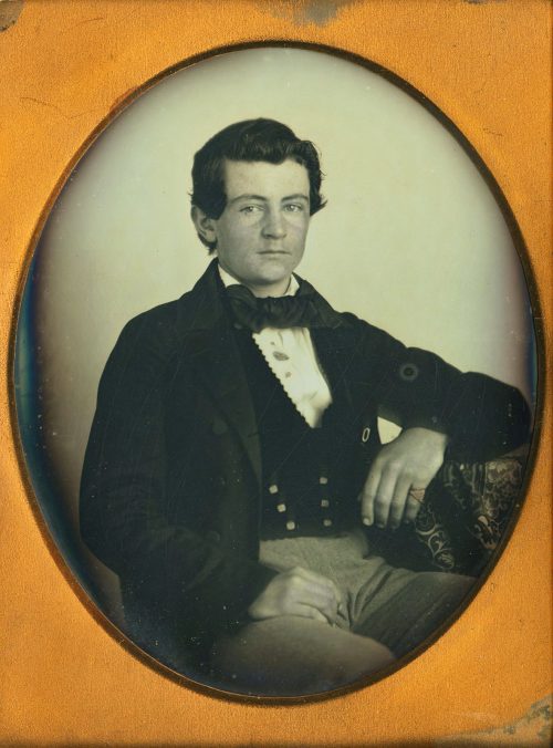 RUDDY-FACED YOUNG MAN.