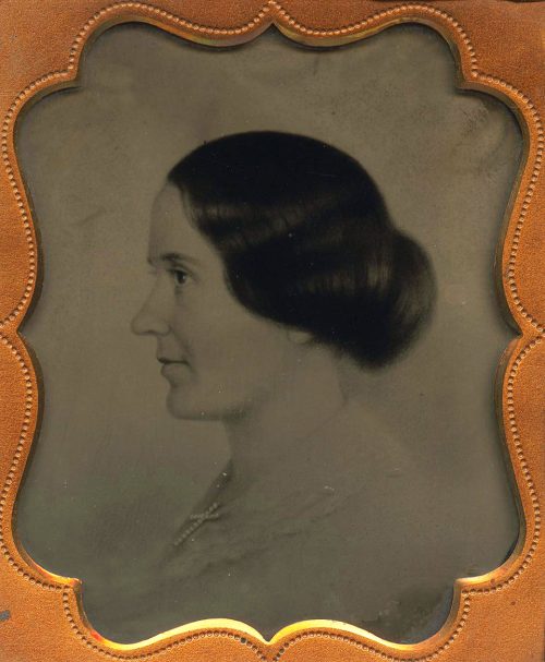 WOMAN IN PROFILE.