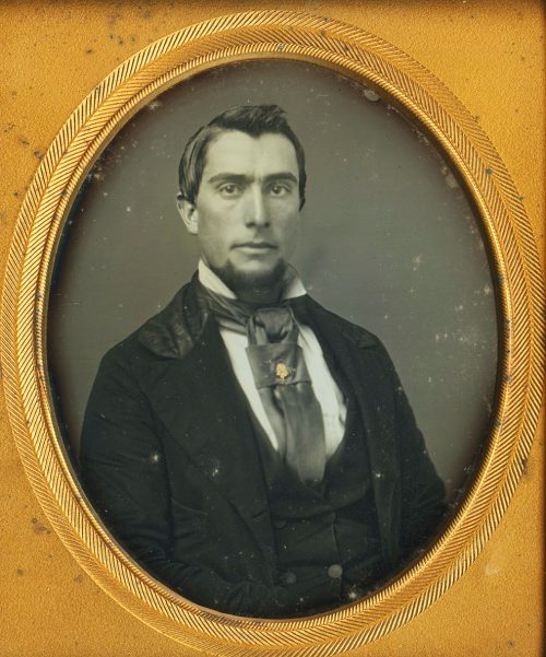 BEARDED YOUNG MAN.